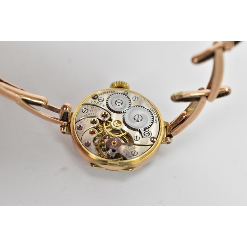 8 - A J.W Benson, manual wind, ladies, 9ct gold wristwatch, circa 1930s, having a silvered dial with Ara... 