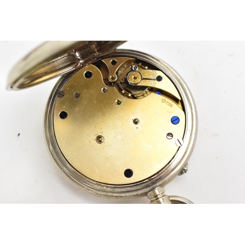 80 - An Edwardian Goliath pocket watch together with a silver fronted travel case, the watch having a whi... 