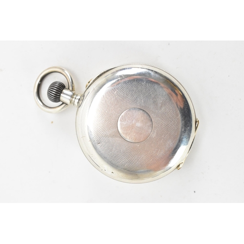 81 - An early 20th century silver open faced keyless wound pocket watch together with a silver fronted tr... 