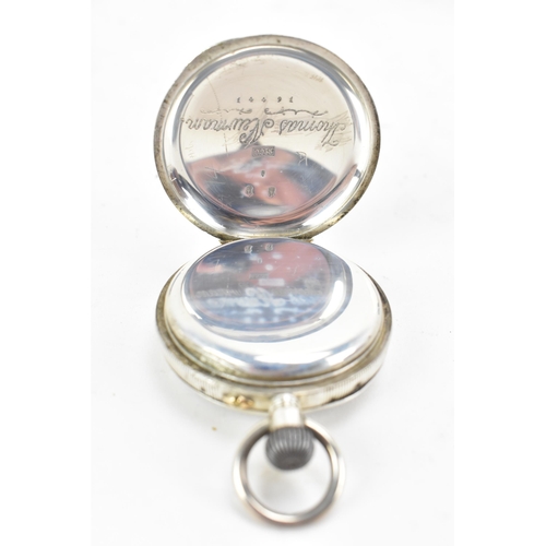 81 - An early 20th century silver open faced keyless wound pocket watch together with a silver fronted tr... 