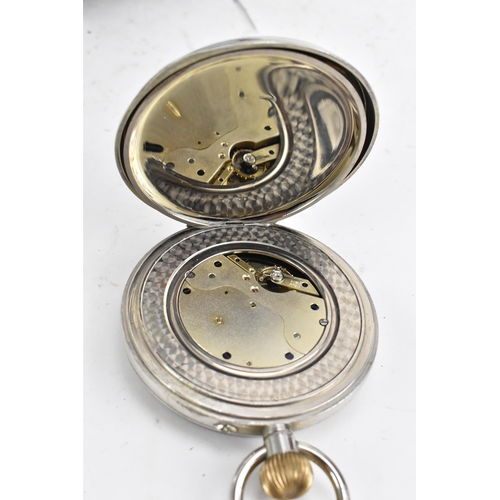 86 - An early 20th century oversized Goliath, open faced, travel pocket watch with case, the white enamel... 