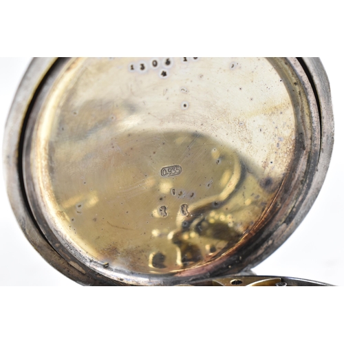 90 - An early 20th century 935 silver, open face, key-less wound Goliath pocket watch with a leather trav... 