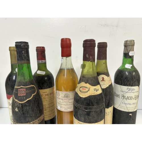 107 - Mixed bottles to include Rioja 1993, Cote's de Bourge 1982, Torres Gran Coronas Reserva 1964, 
Locat... 