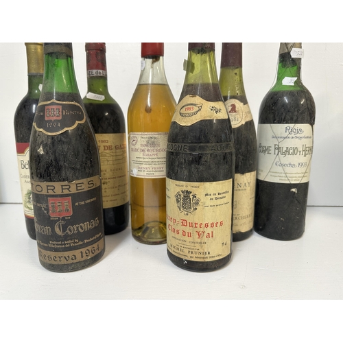 107 - Mixed bottles to include Rioja 1993, Cote's de Bourge 1982, Torres Gran Coronas Reserva 1964, 
Locat... 