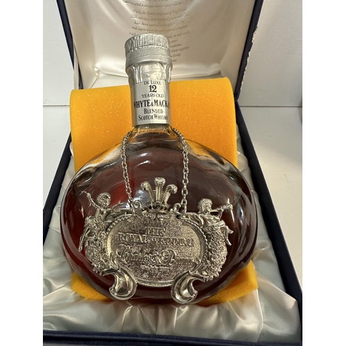 34 - A single bottle of Whyte & Mackay blended Scotch Whisky Delux, 12 year old, commemorating the marria... 