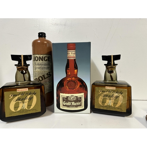 46 - Two bottles of Suntory Royal Rare Old Whisky, 80% proof, (quart), one ceramic bottle of Jonge Dubbel... 