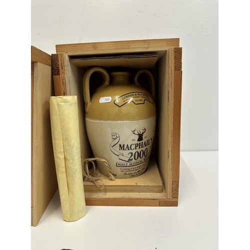 5 - One cased 2lt stoneware flagon of Macphail's 2000 malt scotch whisky,  Location:
If there is no cond... 