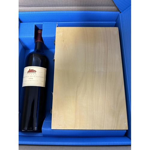 54 - A single bottle of Ermitage du Chateau Cotes du Roussillon 1994 and a wooden cases of Boule balls,  ... 