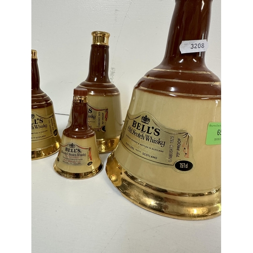 65 - Mixed Bells flasks of old Scotch Whisky, 2 large bottles empty
Location:
If there is no condition re... 