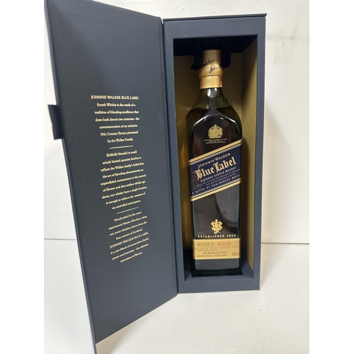 94 - A single bottle of Johnnie Walker Label in presentation box, 70cl,  Location: shelf 3
If there is no... 