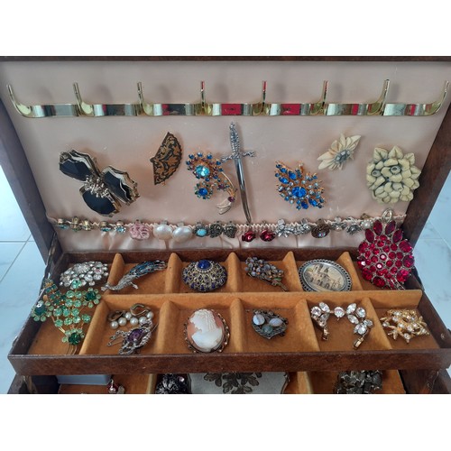 45 - A late 20th Century brown Mele jewellery box and contents to include a quantity of paste stone brooc... 