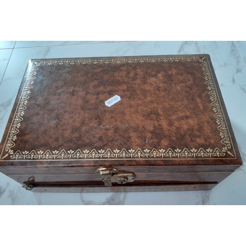 45 - A late 20th Century brown Mele jewellery box and contents to include a quantity of paste stone brooc... 