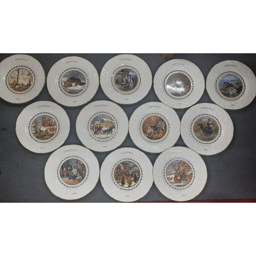 311 - A collection of 12 Coalport Christmas plates, 1976-1987. Location:4.4