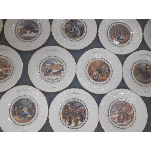 311 - A collection of 12 Coalport Christmas plates, 1976-1987. Location:4.4