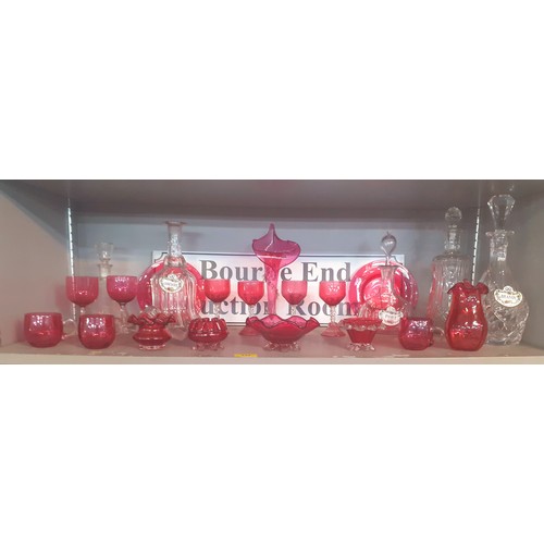 314 - A quantity o 20th Century cranberry glassware together with mixed clear glass decanters and 3 Crown ... 