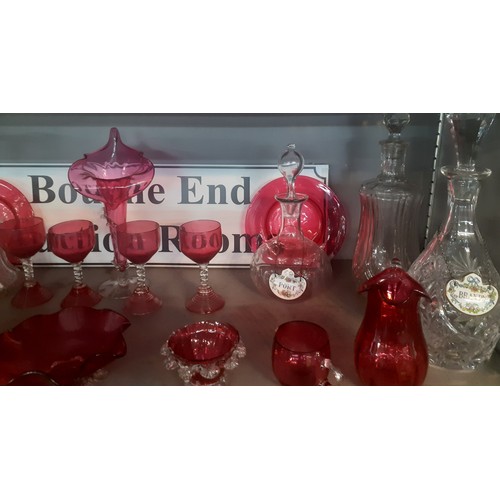 314 - A quantity o 20th Century cranberry glassware together with mixed clear glass decanters and 3 Crown ... 