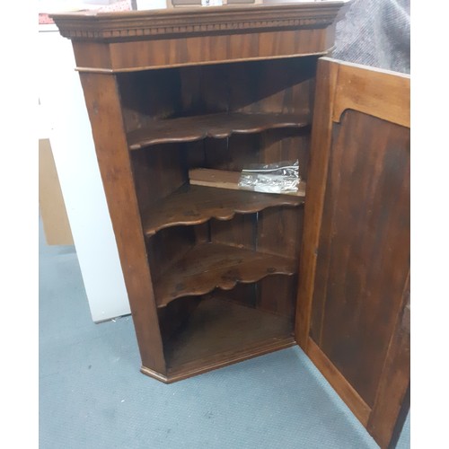 315 - A Georgian oak corner cabinet, 105cm High having 3 internal shelves together with a satinwood pot cu... 