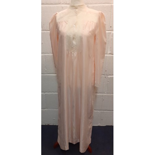 10 - Christian Dior- A pink satin full length ladies night gown having cream lace insertions, approx 36/3... 