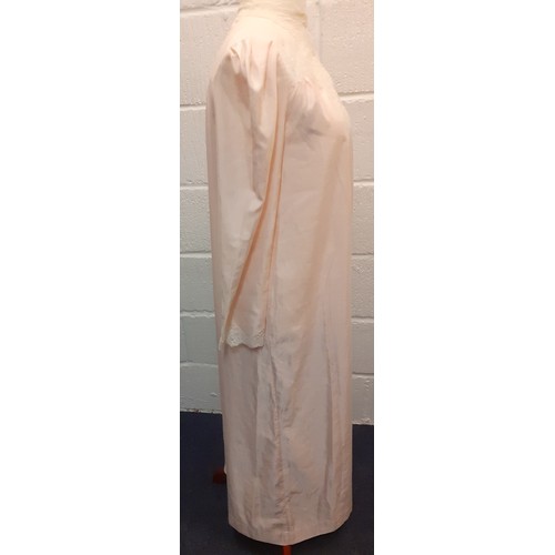 10 - Christian Dior- A pink satin full length ladies night gown having cream lace insertions, approx 36/3... 