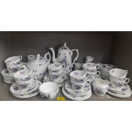 310 - An Aynsley bone china 'Wild Violets' 12-setting tea service and 12-setting coffee service with addit... 