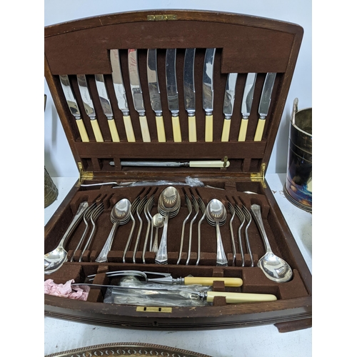 265 - A selection of metalware to include a Thomas Osborne & Co Ltd silver plated cutlery set in a walnut ... 