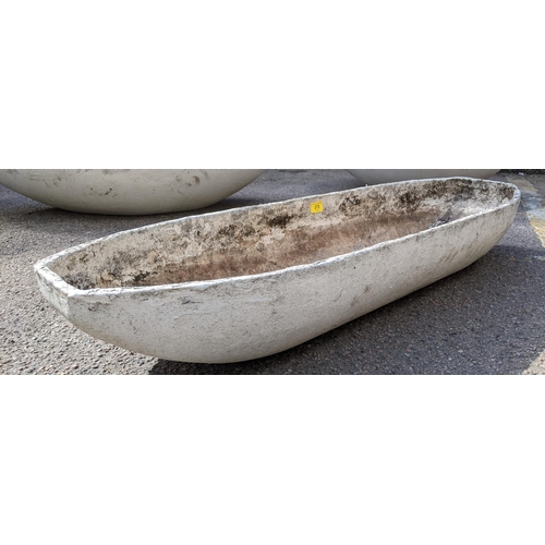 273 - An Ulrastone fibrecrete weathered garden planter of boat form, probably designed by Willy Ghul circa... 