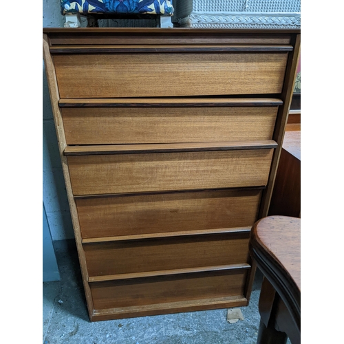 275 - A mid-century teak dressing table with mirror, possibly Austinsuite, the base with six short drawers... 