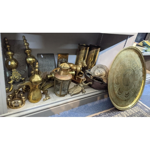 302 - Mixed metalware to include a brass Middle Eastern engraved tray, a boot jack, dallah coffee pot and ... 