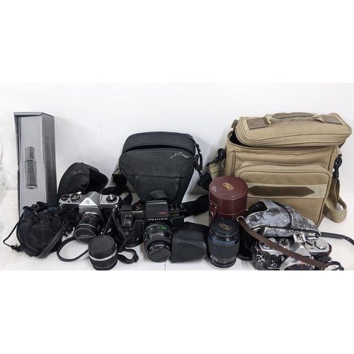 337 - Mixed cameras and accessories to include an Olympus, Asahi Pentax, Carl Zeiss Jena lens and other it... 