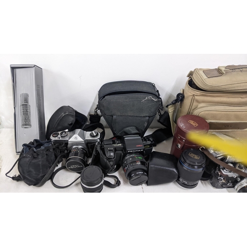 337 - Mixed cameras and accessories to include an Olympus, Asahi Pentax, Carl Zeiss Jena lens and other it... 