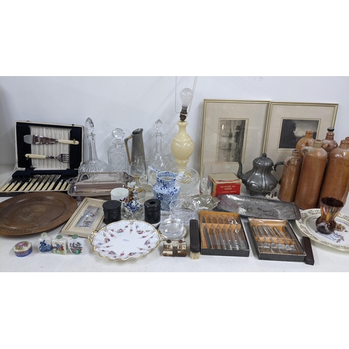 338 - A mixed lot to include a silver plated entree dish, Chinese scent bottles, decanters, signed engravi... 