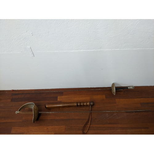 353 - Two fencing foils and a truncheon
Location:G
If there is no condition report shown, please request