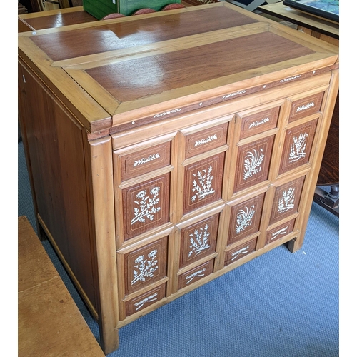 375 - A Chinese pine cabinet, the front inlaid with bone panels and having a hinged top revealing storage ... 