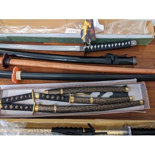 352 - Two graduated sets of three blunt Samori style swords, tow broken and another blunt sword
Location:G... 