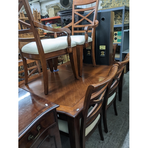 277 - A modern extending dining room table with two extra leaves 77cm x approx.65 (when unextended) x 104c... 