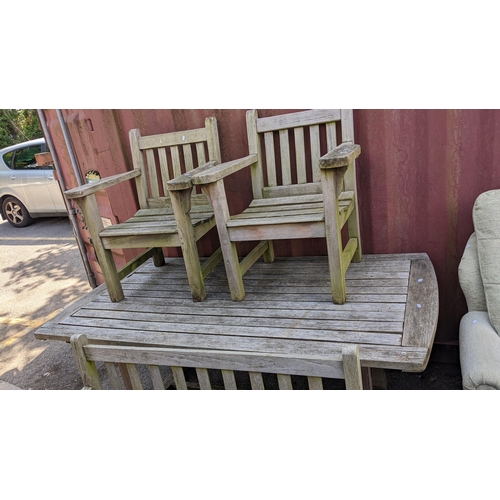 378 - A garden teak table, 75.5cm h x 190cm w, together with a two seater chair two armchairs
Location:LB
... 