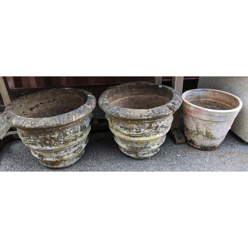 379 - A pair of reconstituted stoneware garden planters, 41cm h x 52cm w, together with a terracotta plant... 