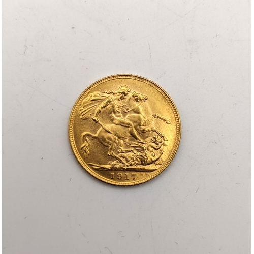 72 - A gold coin dated 1917 with St George on the obverse, 7.9g, test as around 18ct gold
Location: CAB 1... 