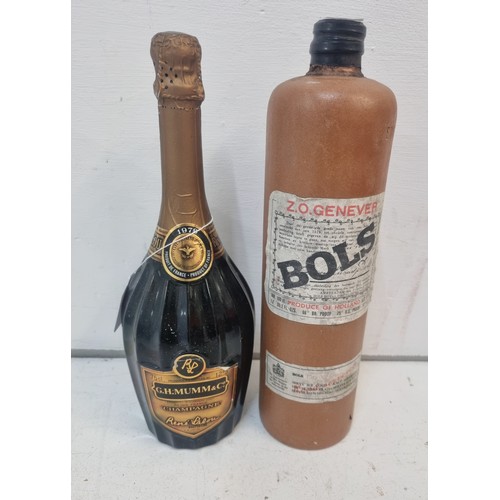 125 - One bottle of G H Mumm & Co Champagne Vintage 1979, one flask of Bols Genever Gin,  Location: R2
If ... 