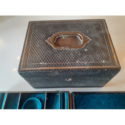 39 - A Victorian leather jewellery box with fitted compartments and contents comprising of vintage silver... 