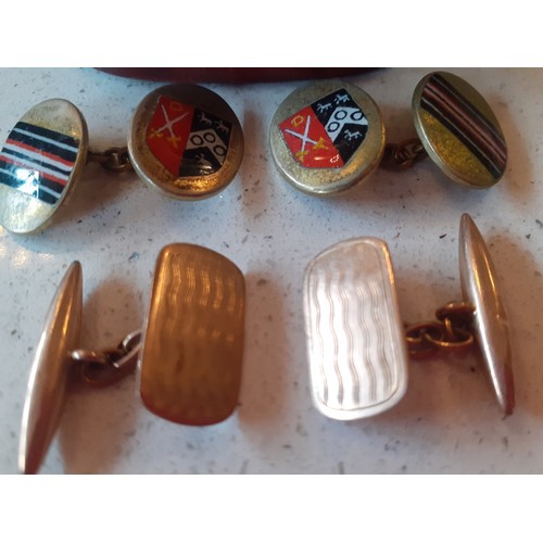 57 - Two pairs of cufflinks comprising a pair of 9ct gold cufflinks stamped 375, 4.2g and a pair of 1930'... 