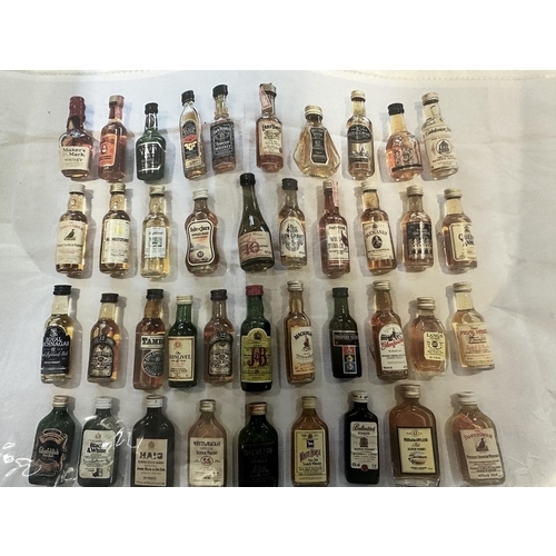 101 - A very large collection of over 290 miniatures, to include Scotch Whisky, Vodka, ceramic novelty min... 