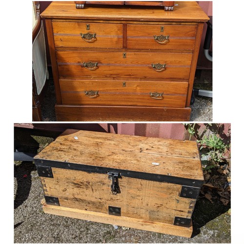 521 - An Edwardian chest of two short and two long drawers standing on a plinth base, 76cm high x 91.5cm w... 