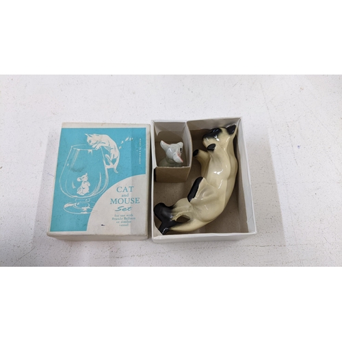 420 - A novelty cat and mouse drinking set with crystal cut brandy glasses, boxed
Location:7.2
If there is... 