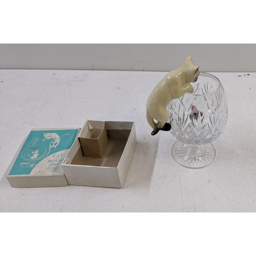 420 - A novelty cat and mouse drinking set with crystal cut brandy glasses, boxed
Location:7.2
If there is... 