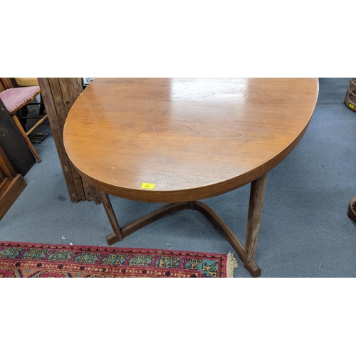 423 - A mid 20th century Danish teak oval topped dining table, attributed to Johannes Anderson, 73.5cm h x... 