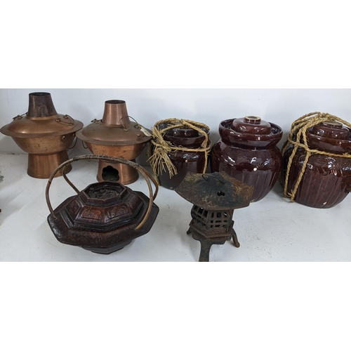 427 - A mixed lot to include two Chinese copper cooking pots, a treen rice pot, lantern and other items
Lo... 