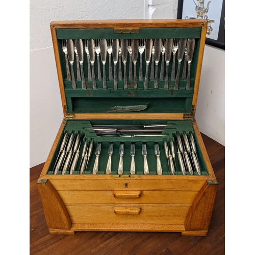 431 - An Art Deco style early/mid 20th century canteen of cutlery with two drawers and a lift-open compart... 