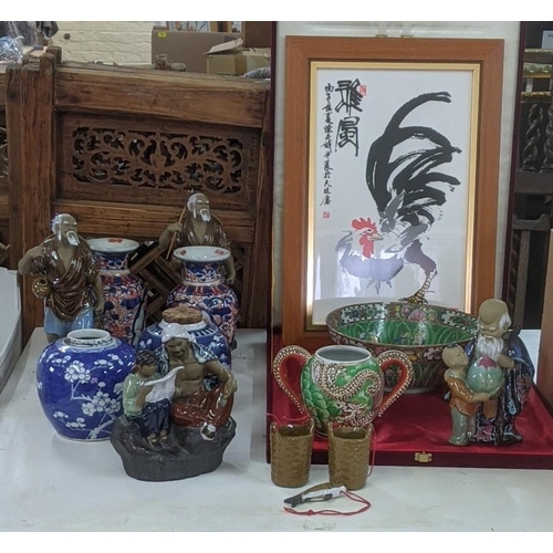 476 - A mixed lot of Oriental items to include an early 20th century Chinese canton famille rose bowl A/F,... 