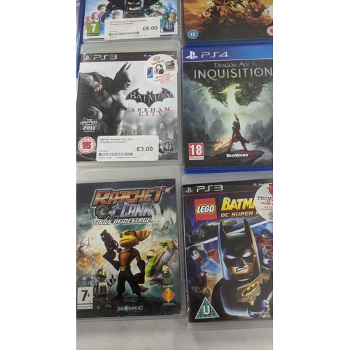 478 - A mixed lot to include PS3 and PS4 games to include Batman Arkham City and others along with DVDs to... 